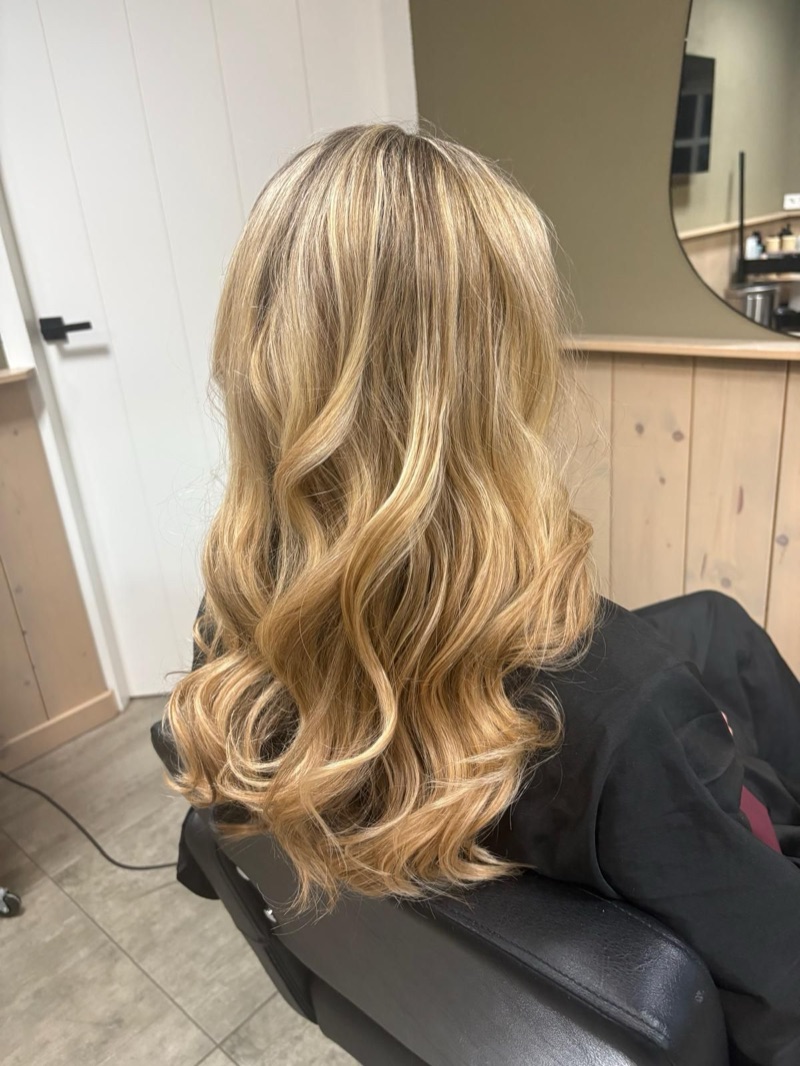 Lang haar met grote, losse krullen